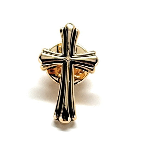 Gold and black cross pendant on a white background