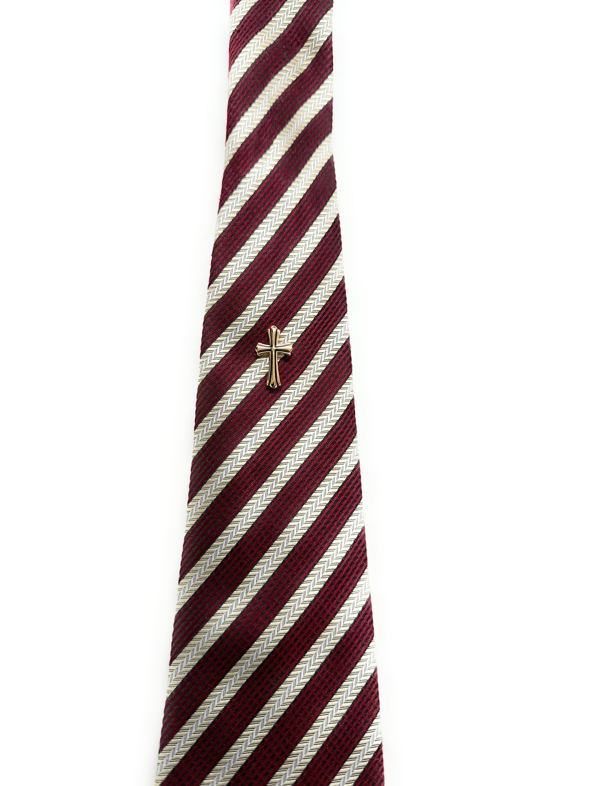 Maroon and white striped tie with a gold clasp on a white background