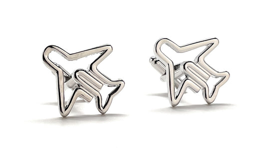 Silver airplane-shaped earrings on a white background