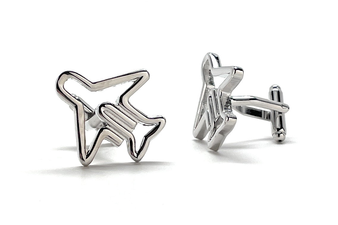 Silver star-shaped cufflinks on a white background