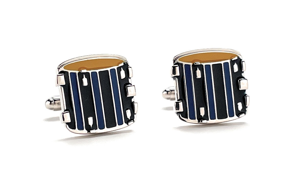 Pair of drum-shaped cufflinks with black and blue stripes on a white background