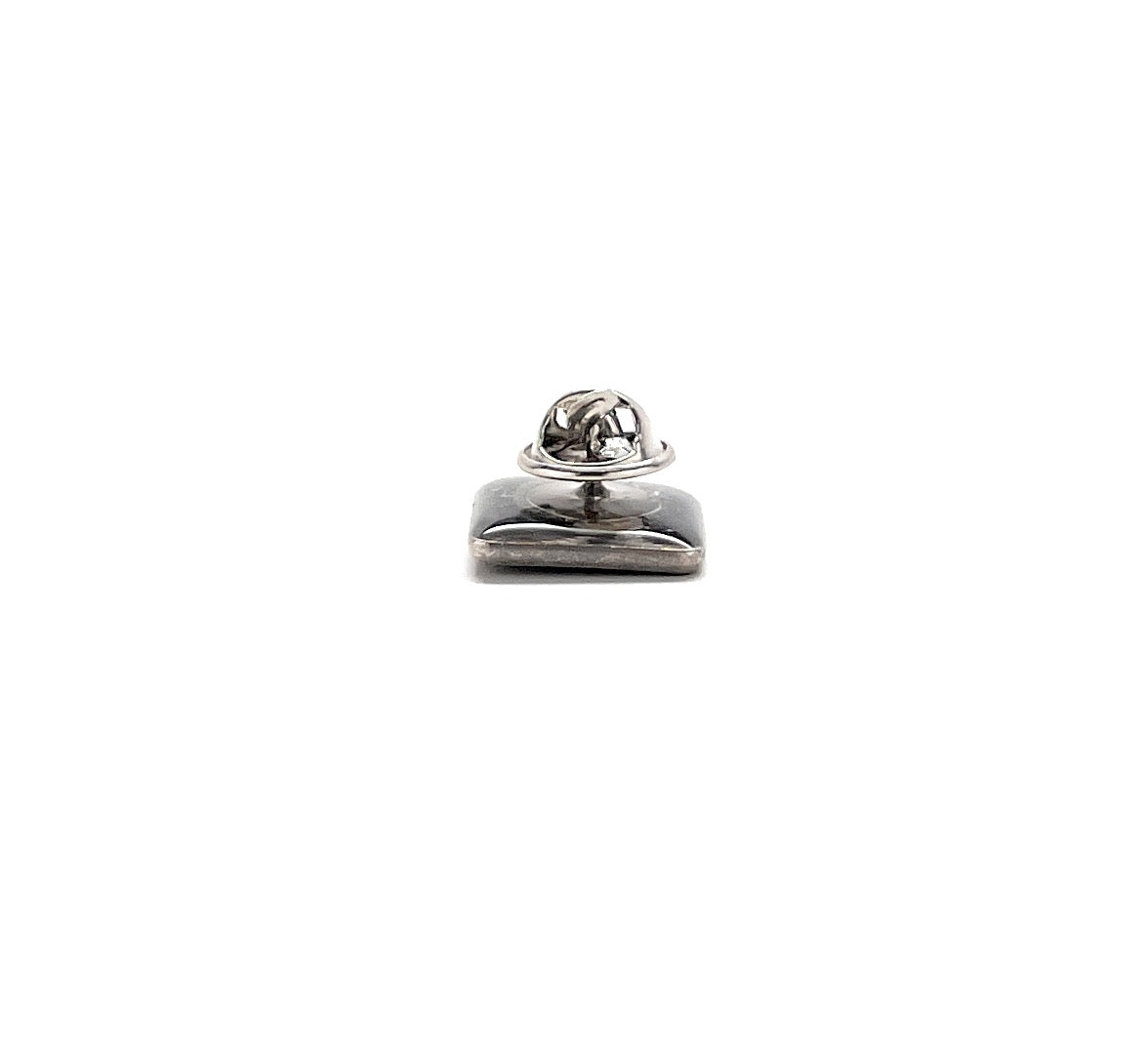 Silver pendant on a white background