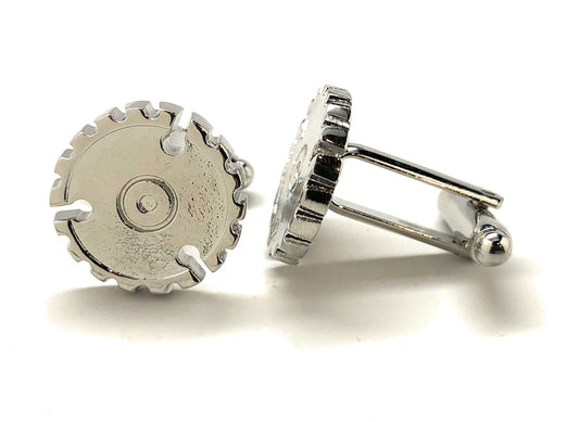 Silver gear-shaped cufflinks on a white background