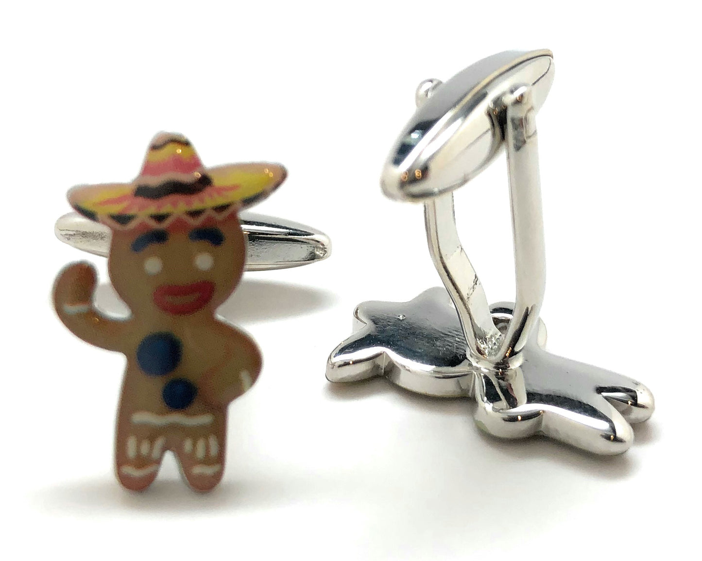 Gingerbread man and football cufflinks on a white background