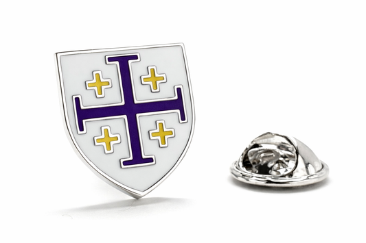 Shield-shaped badge with purple cross and yellow crosses on a white background