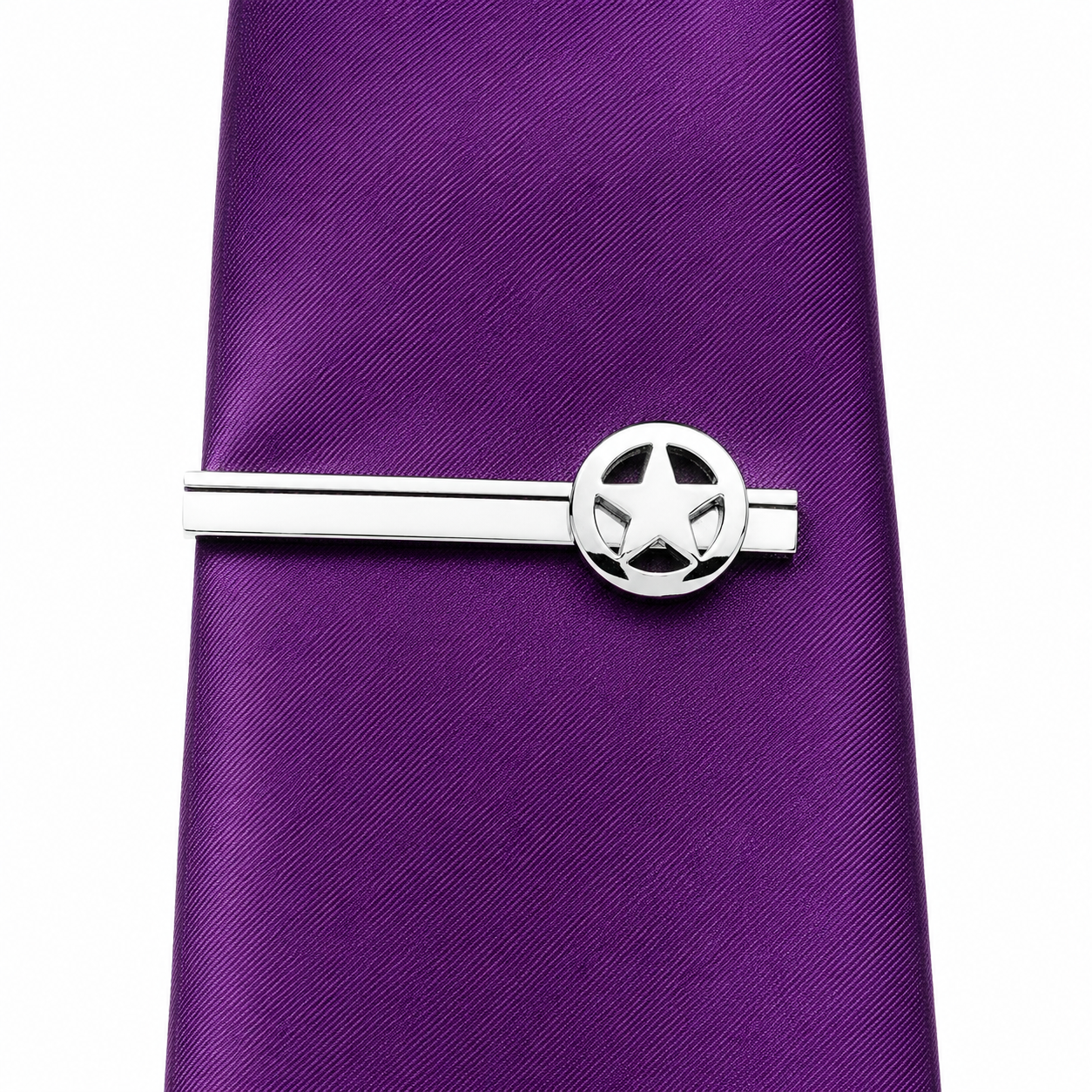 Silver Lone Star Tie Clip for Men with polished Texas star design and black accent stripe on a white background on purple tie