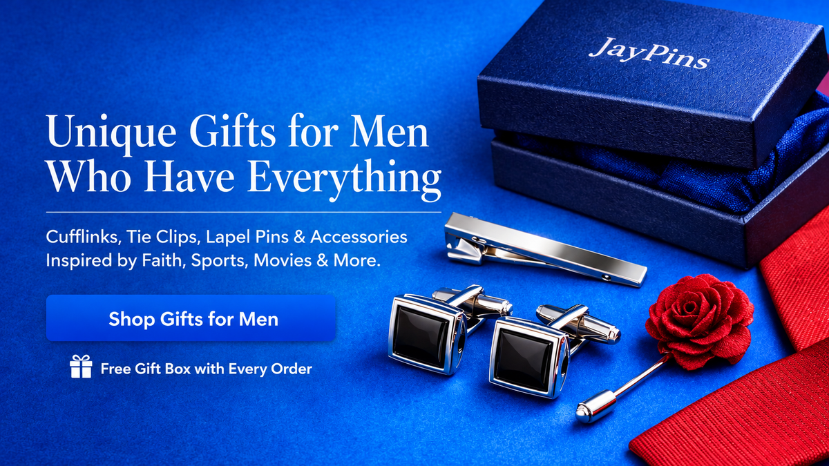 JayPins gifts for men featuring silver cufflinks, tie clip, red rose lapel pin and blue gift box on a blue background.