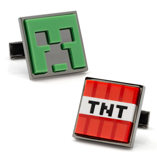 Two cufflinks with a green block and TNT design on a white background