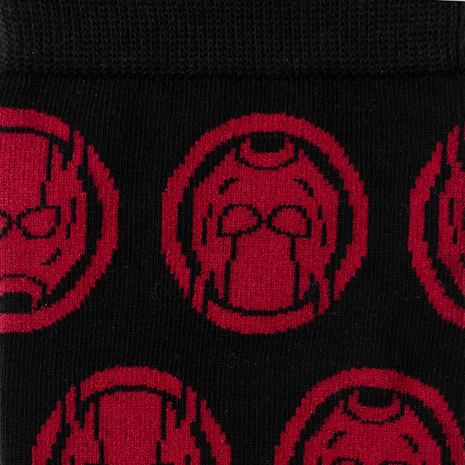 Black socks with red superhero logo pattern