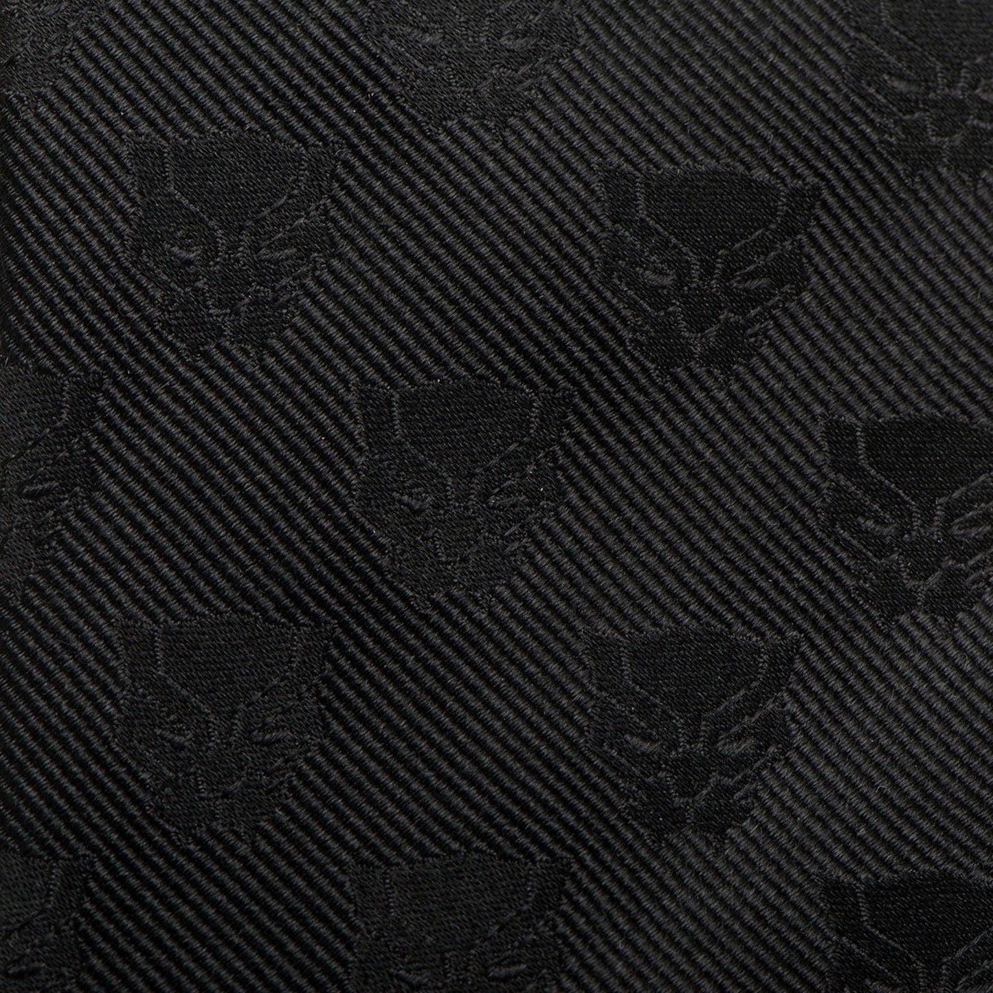 Black patterned fabric with a diagonal stripe design