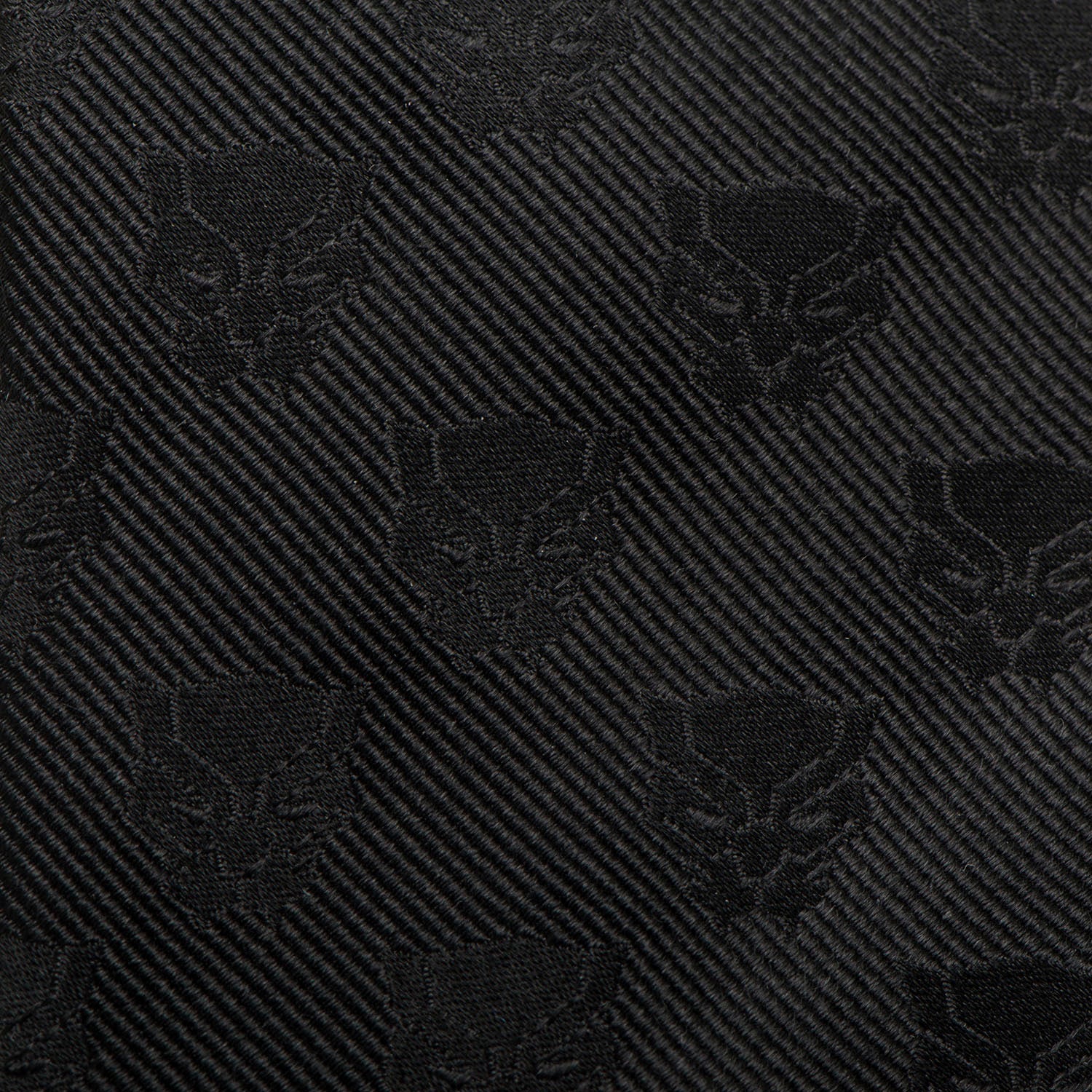 Black patterned fabric with a diagonal stripe design