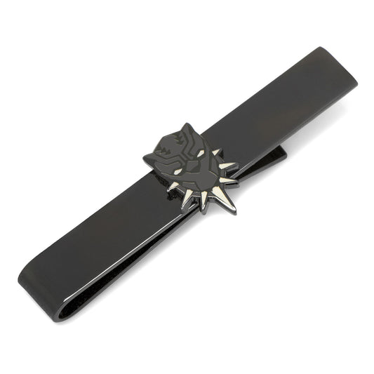 Black tie clip with a detailed emblem on a white background
