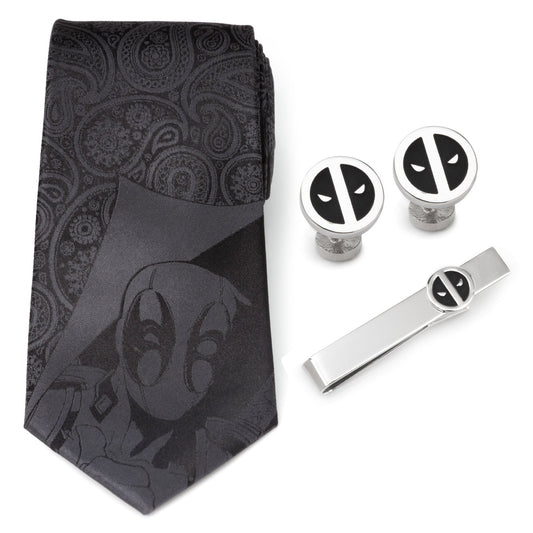 Black tie with graphic design and matching cufflinks and tie clip on a white background