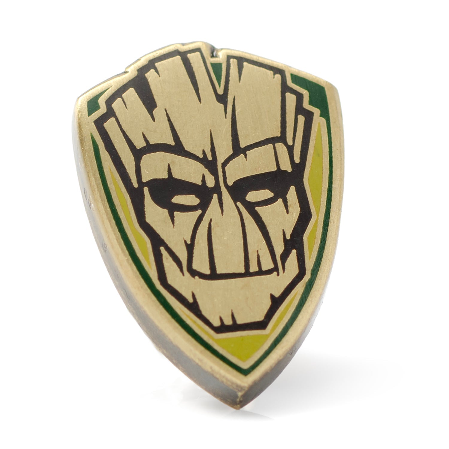 Shield-shaped object with a face design on a white background