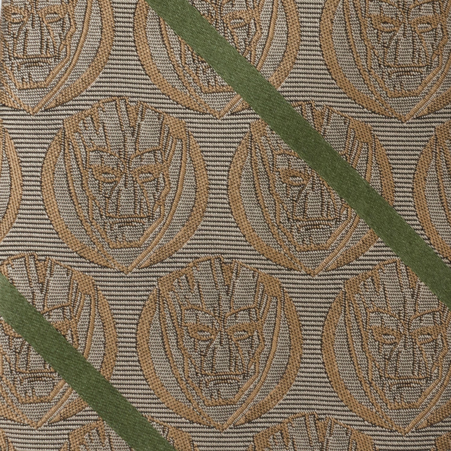 Close-up of a fabric with a pattern of circular designs on a textured background.
