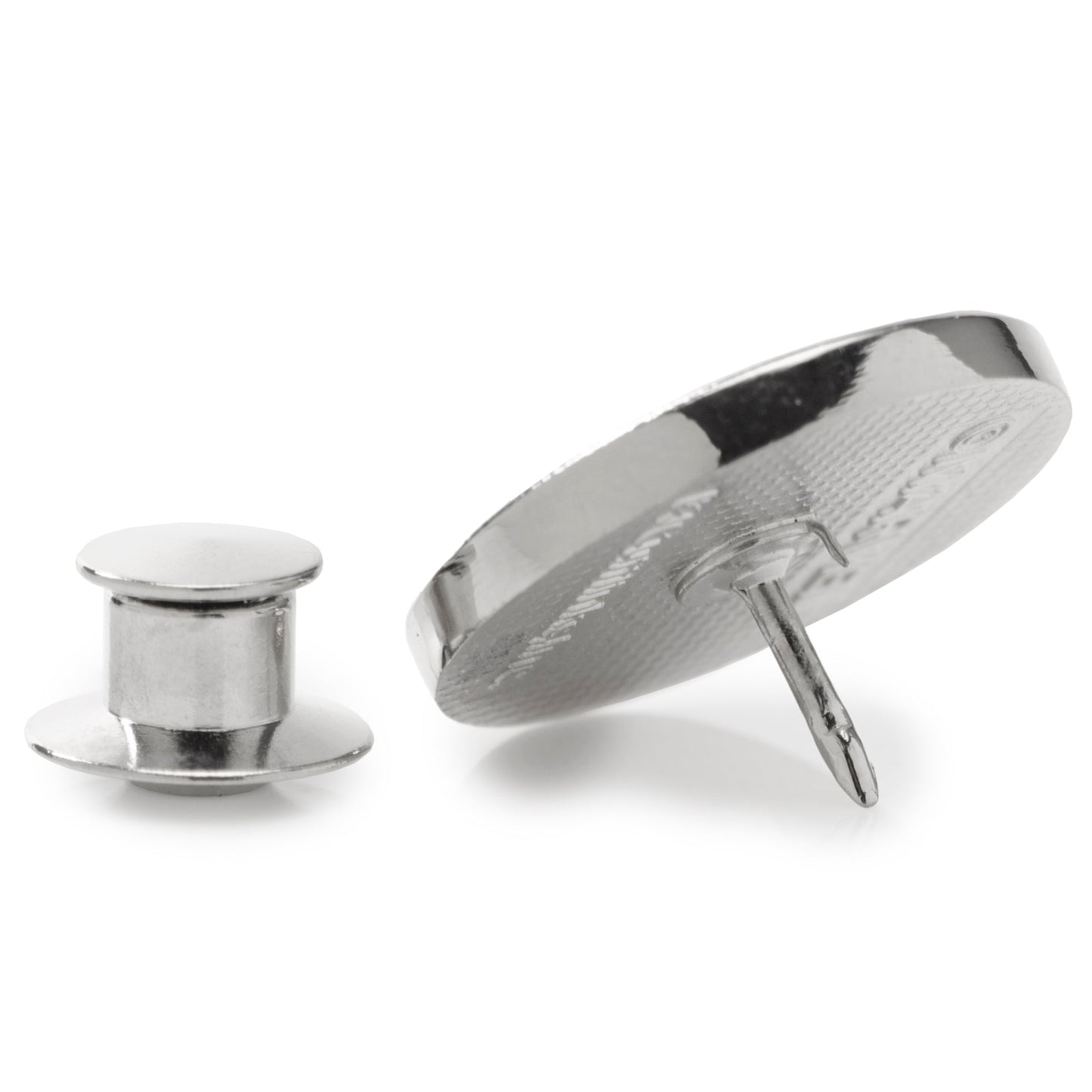 Silver cufflinks on a white background