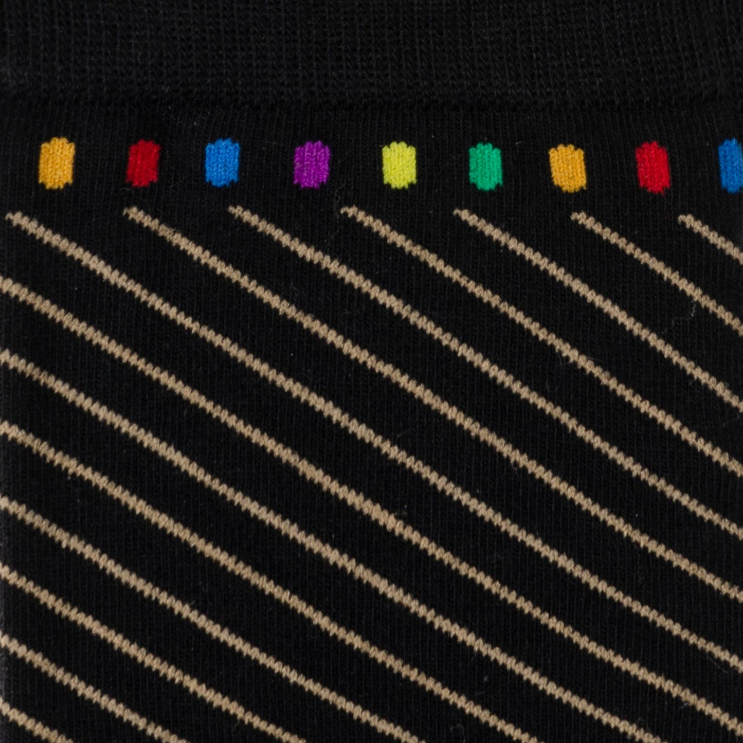 Black sock with rainbow-colored dots at the top and diagonal lines.