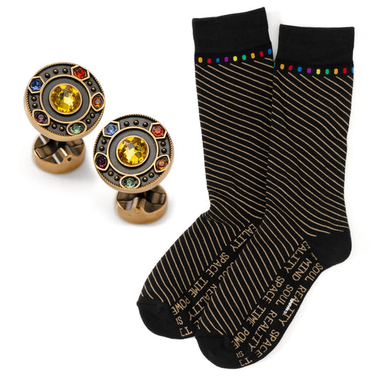 Pair of cufflinks with gemstones and a black sock with text on a white background