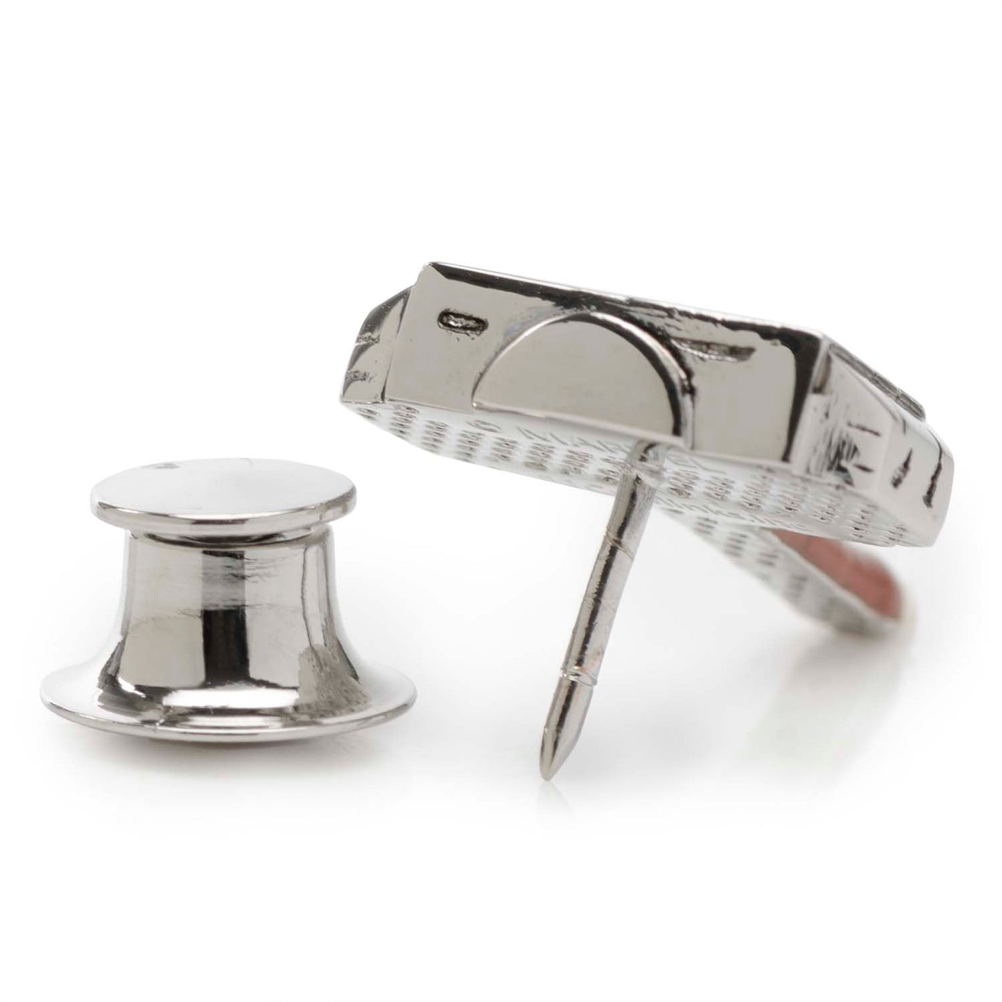 Silver cufflinks on a white background