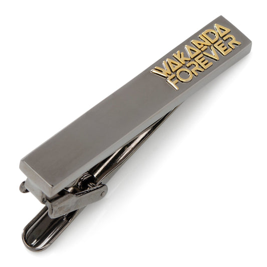 Metallic tie clip with 'Wakanda Forever' text on a white background