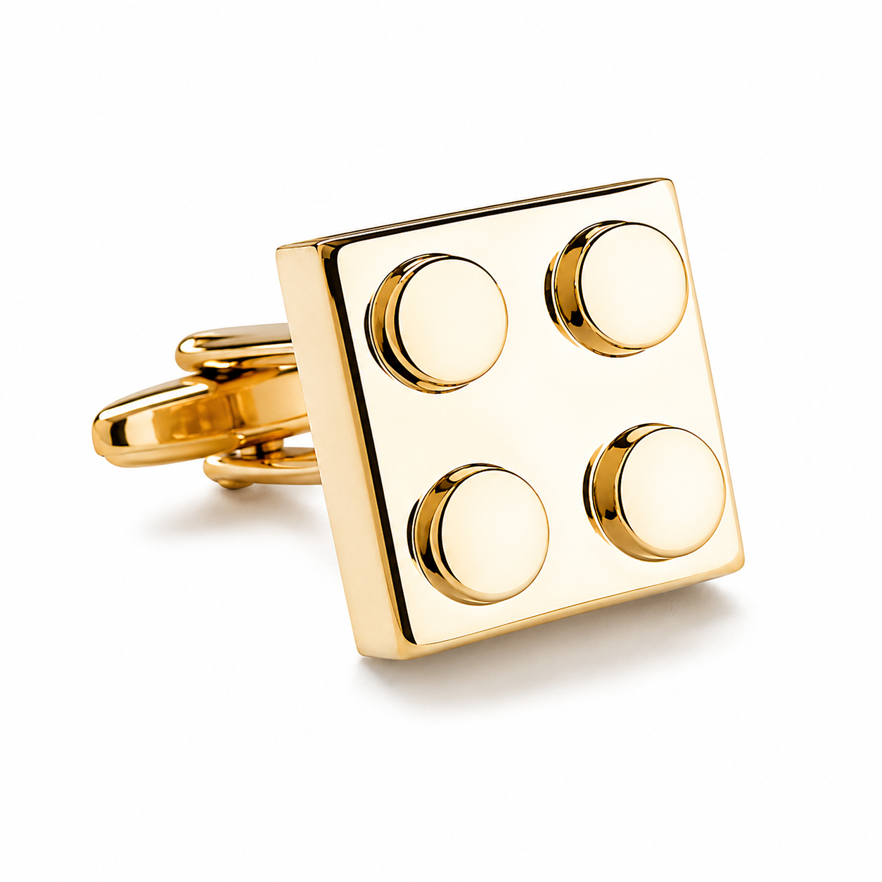 Gold Master Builder cufflinks with building block inspired design on a pure white background