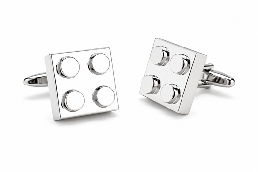 Silver block-shaped cufflinks on a white background