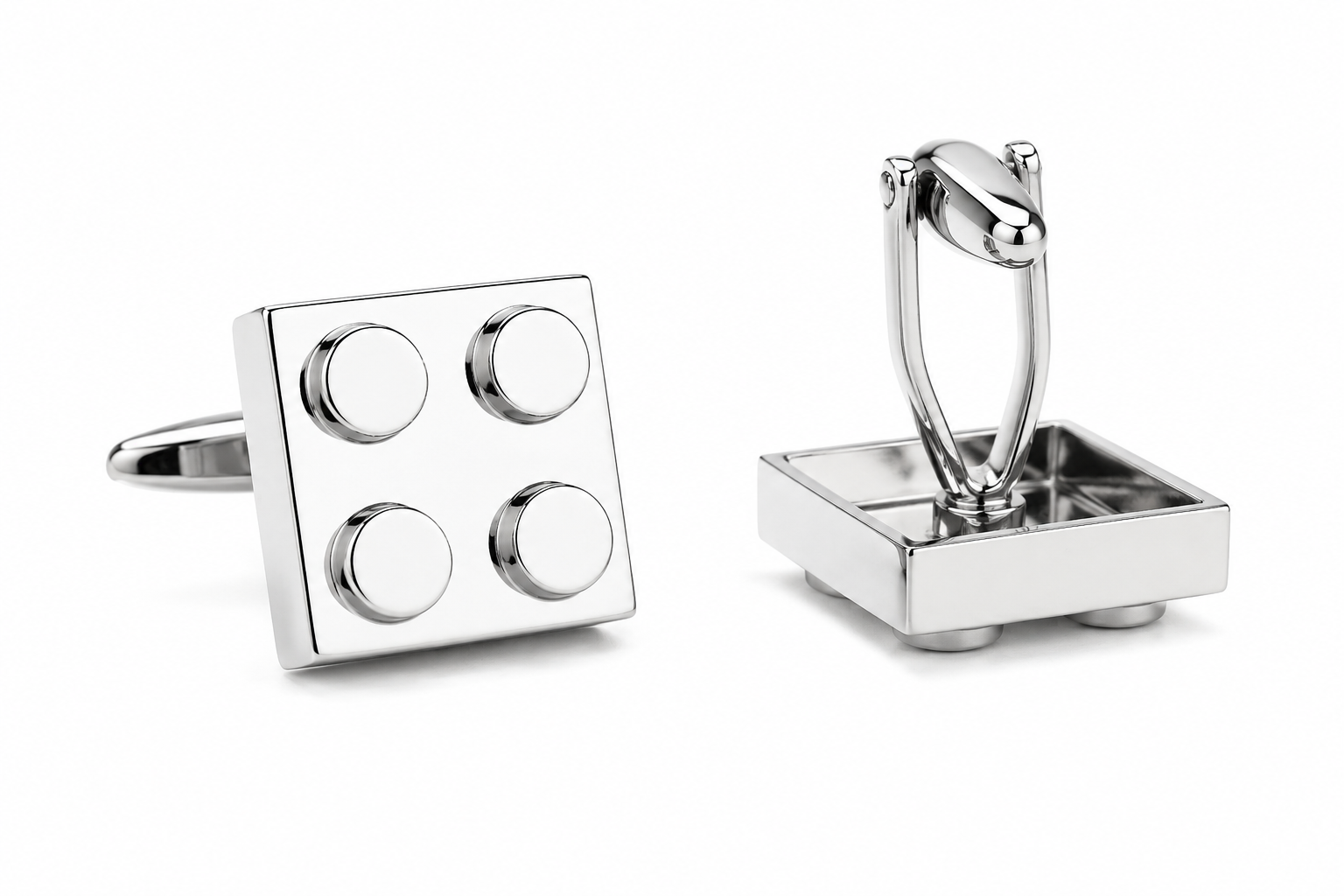 Silver square cufflinks with circular design on a white background