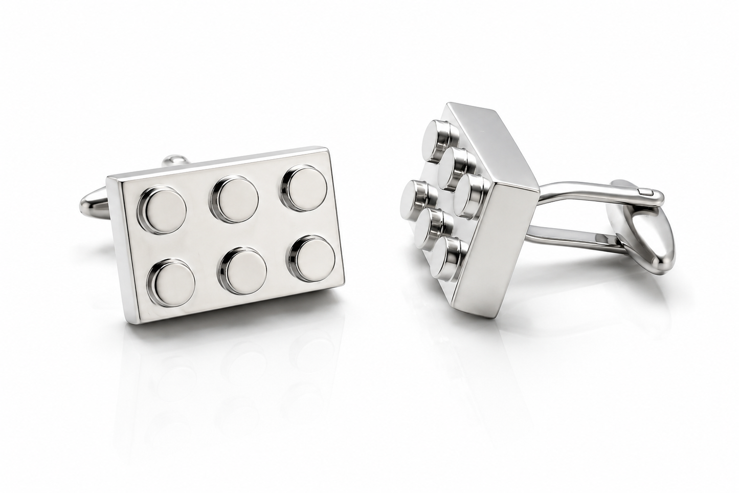 Silver building block cufflinks with polished metal finish displayed on white background