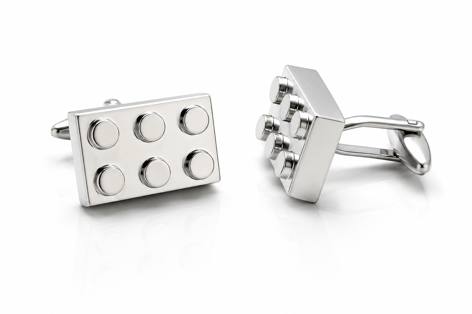 Silver building block cufflinks with polished metal finish displayed on white background