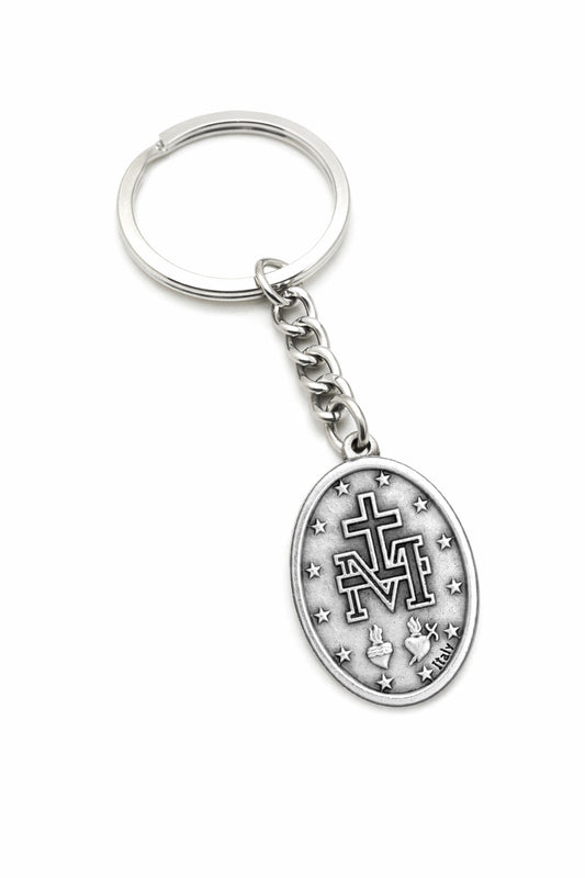 Miraculous Medal Catholic keychain with Marian M cross and sacred hearts on white background
