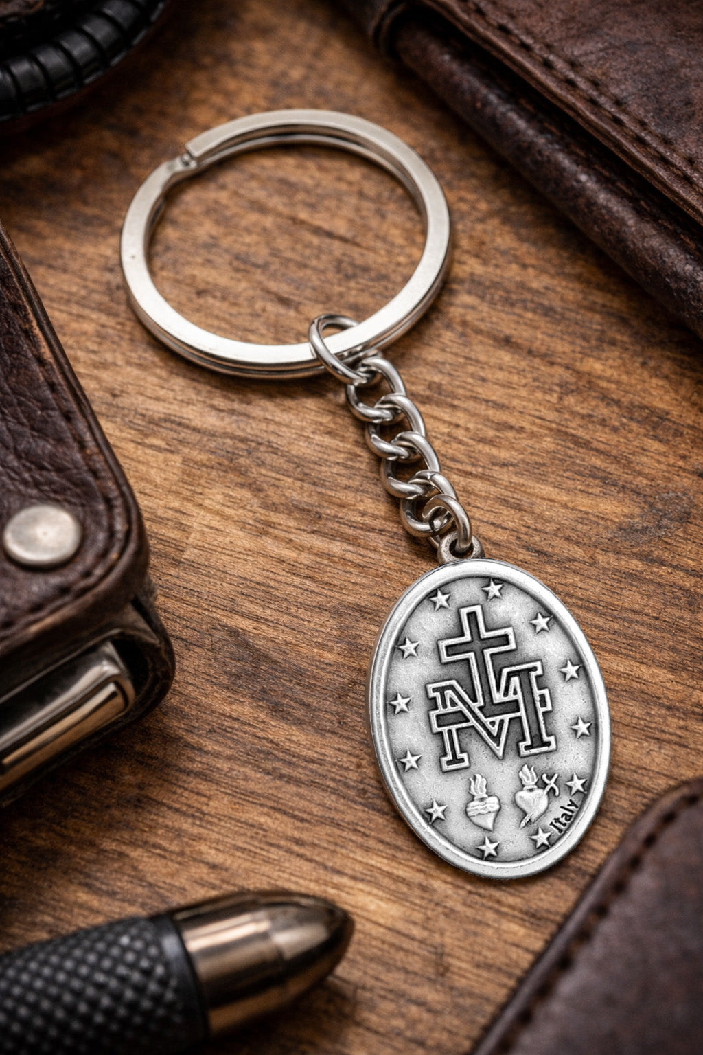 Miraculous Medal Catholic keychain with Marian M cross and sacred hearts on white background