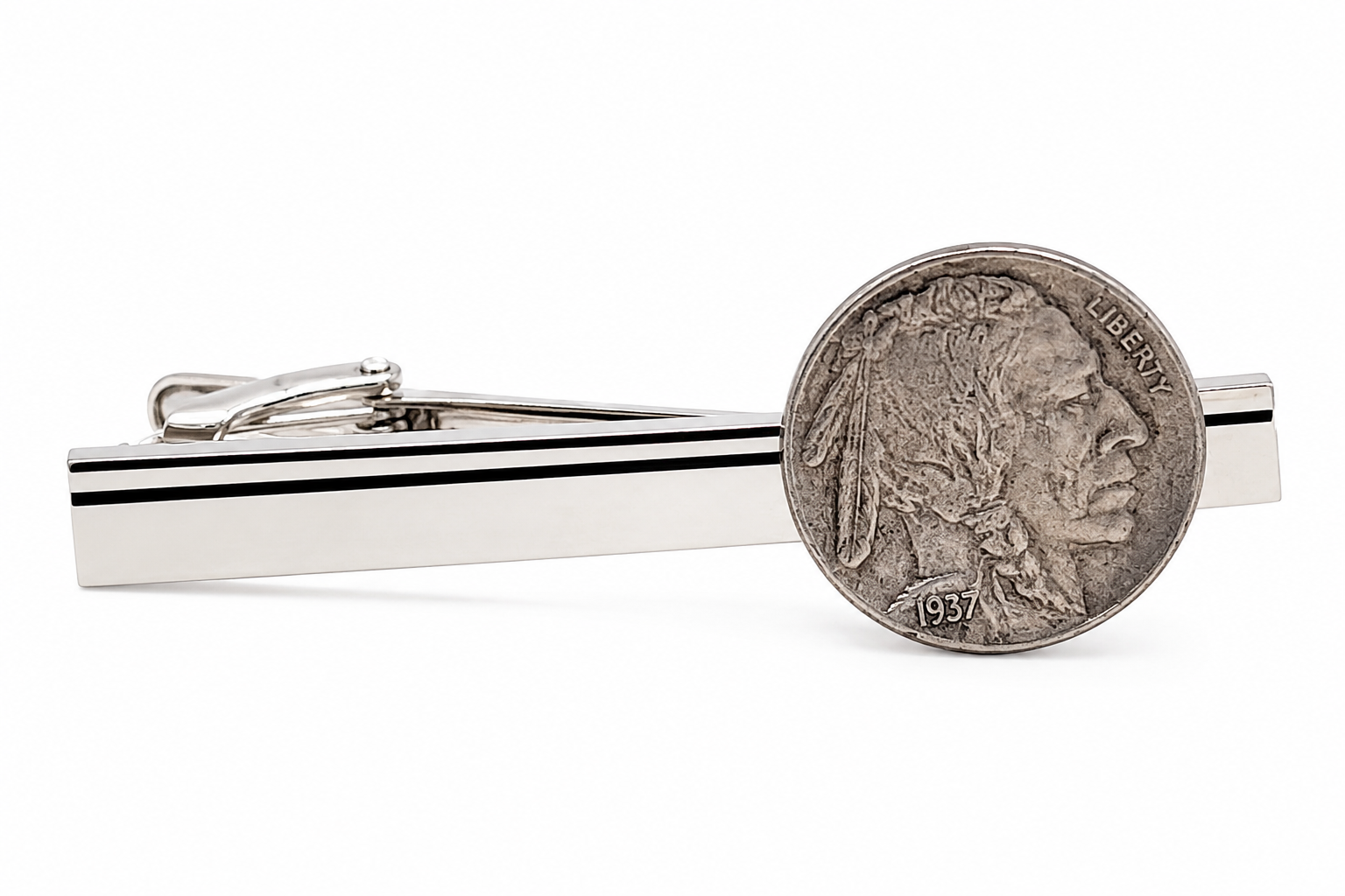 A silver-toned metal tie clip bar with two thin black horizontal stripes, shown alongside a 1937 Buffalo nickel coin for scale, on a clean white background.