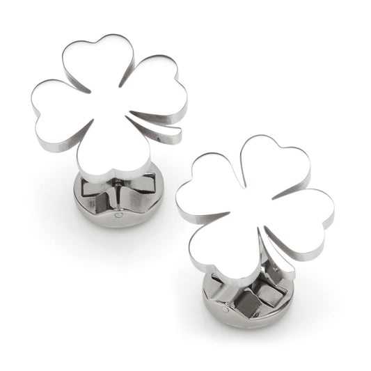 Metallic four-leaf clover-shaped cookie cutters on a white background