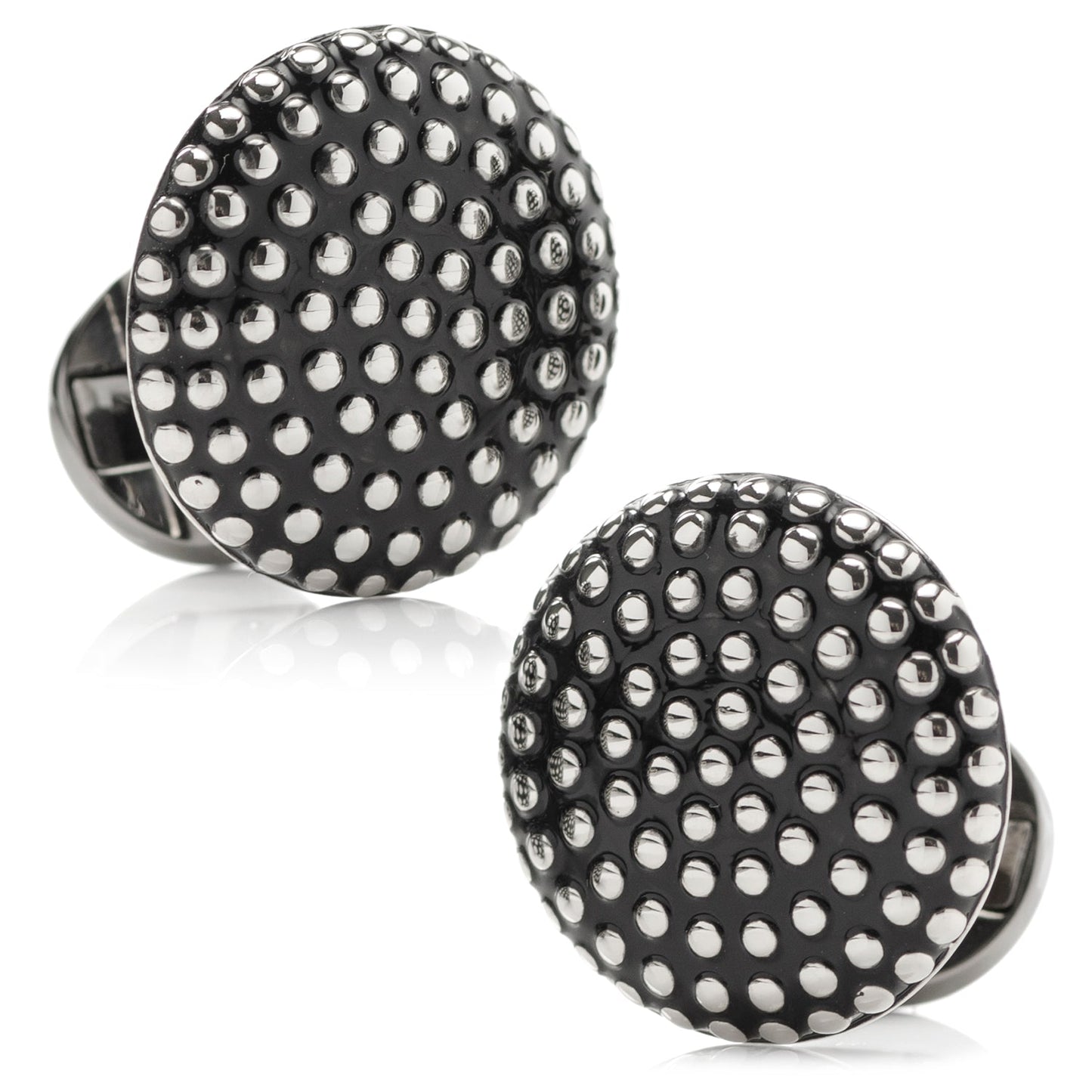Black cufflinks with silver studs on a white background