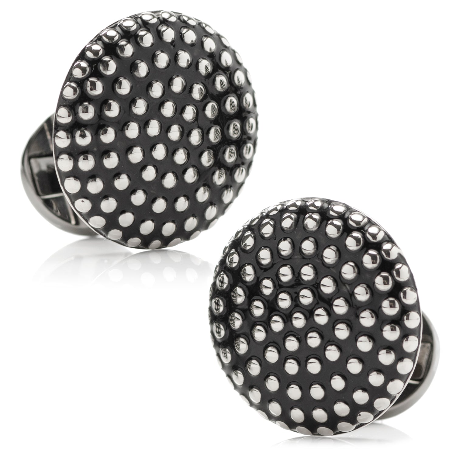 Black cufflinks with silver studs on a white background
