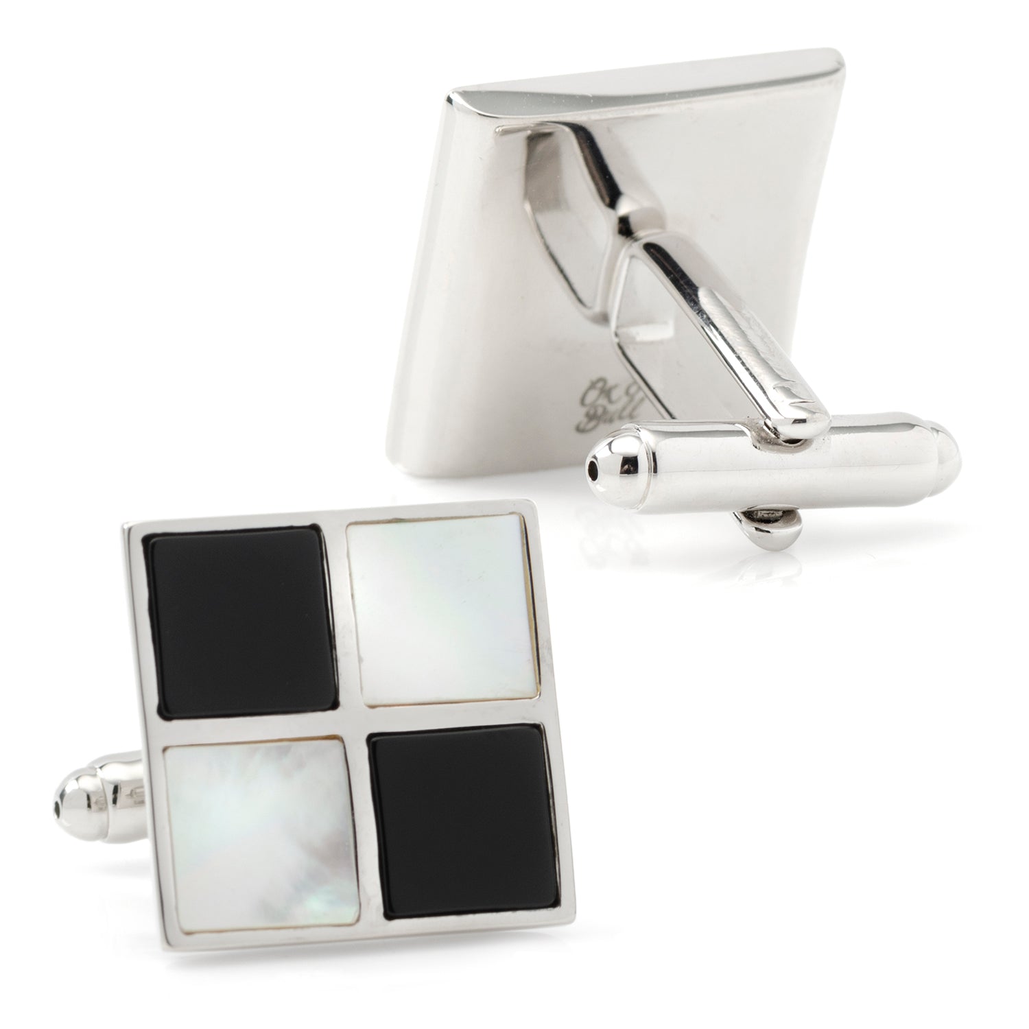 Cufflinks with black and white square design on a white background