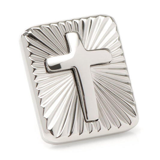Silver cross pendant with sunburst design on a white background
