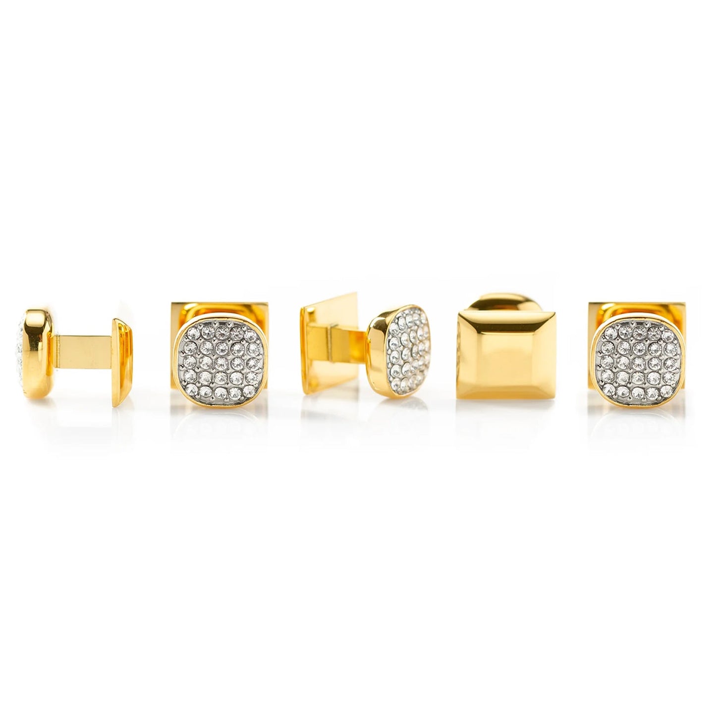 Set of gold and silver cufflinks on a white background