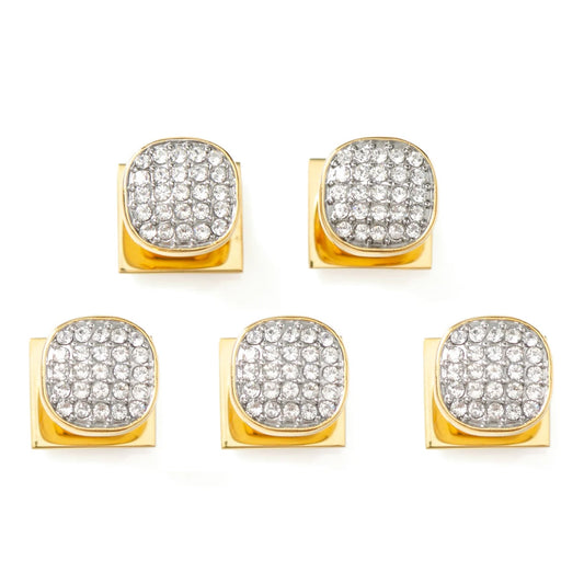 Set of gold earrings with clear gemstones on a white background