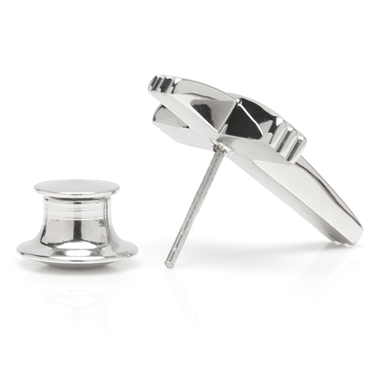 Silver earring on a white background