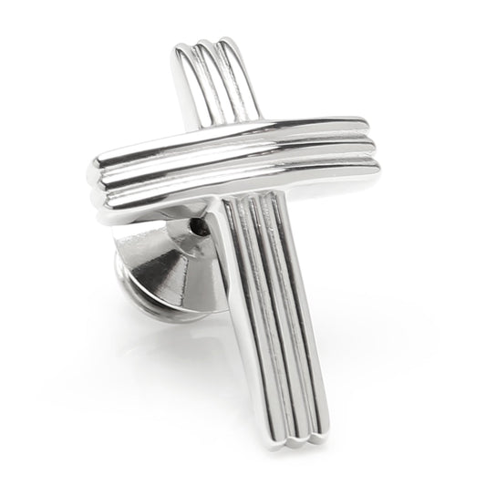 Silver cross-shaped cufflink on a white background