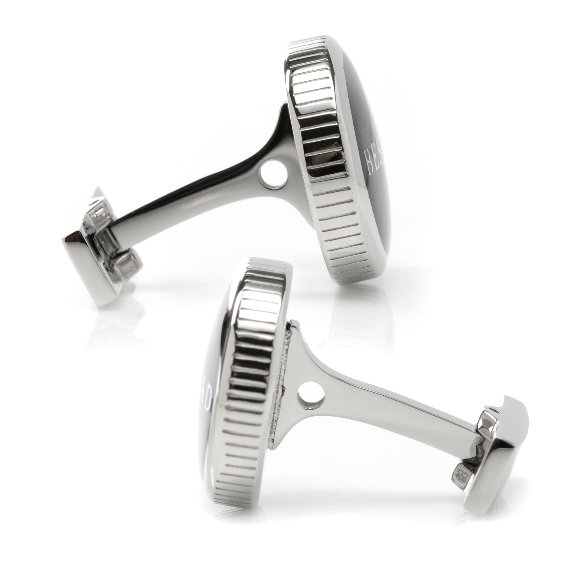 Pair of silver cufflinks on a white background