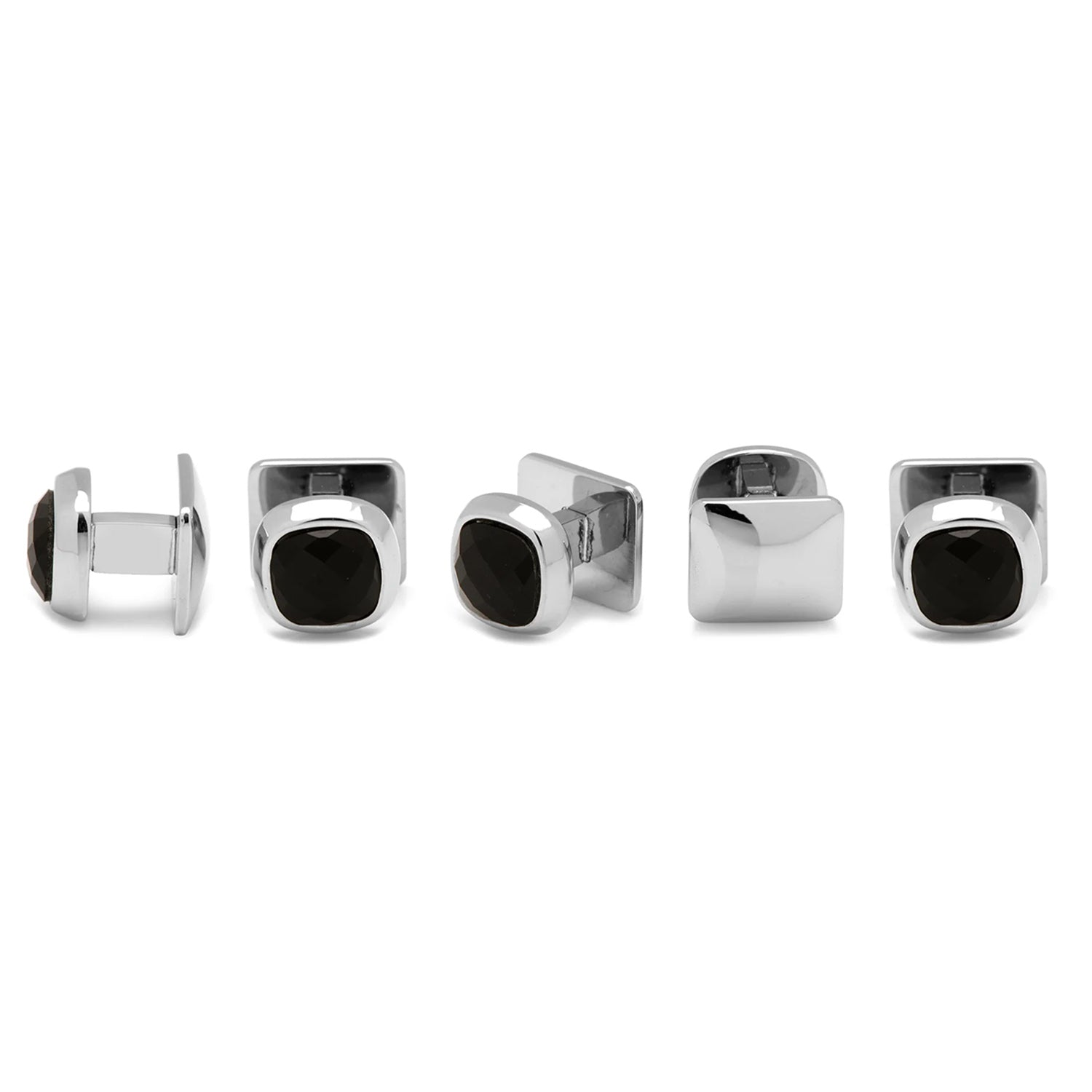 Set of silver and black cufflinks on a white background