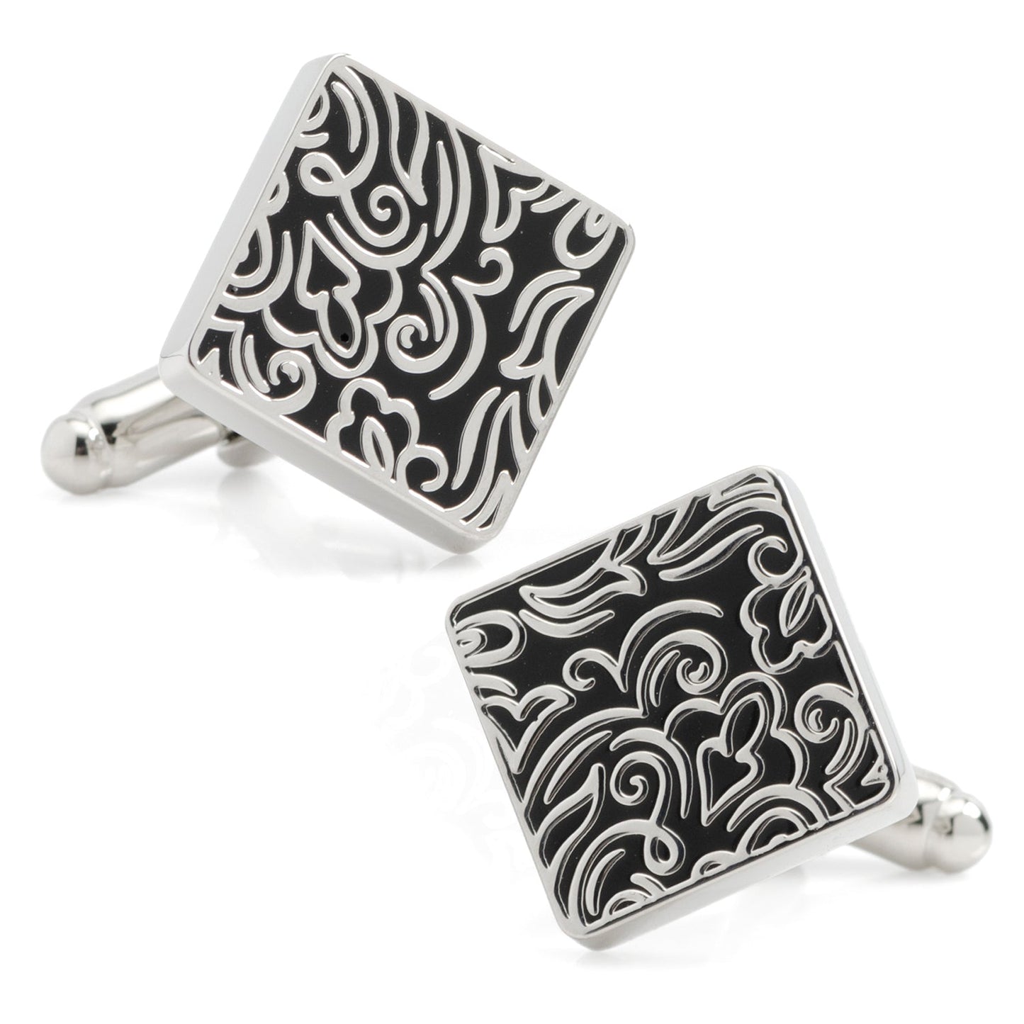 Pair of black and silver patterned cufflinks on a white background