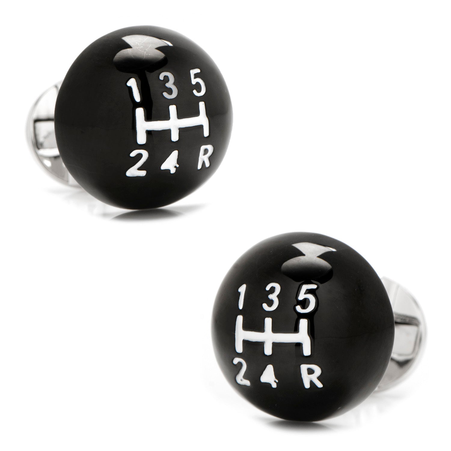 Black gear shift cufflinks with white numbering on a white background