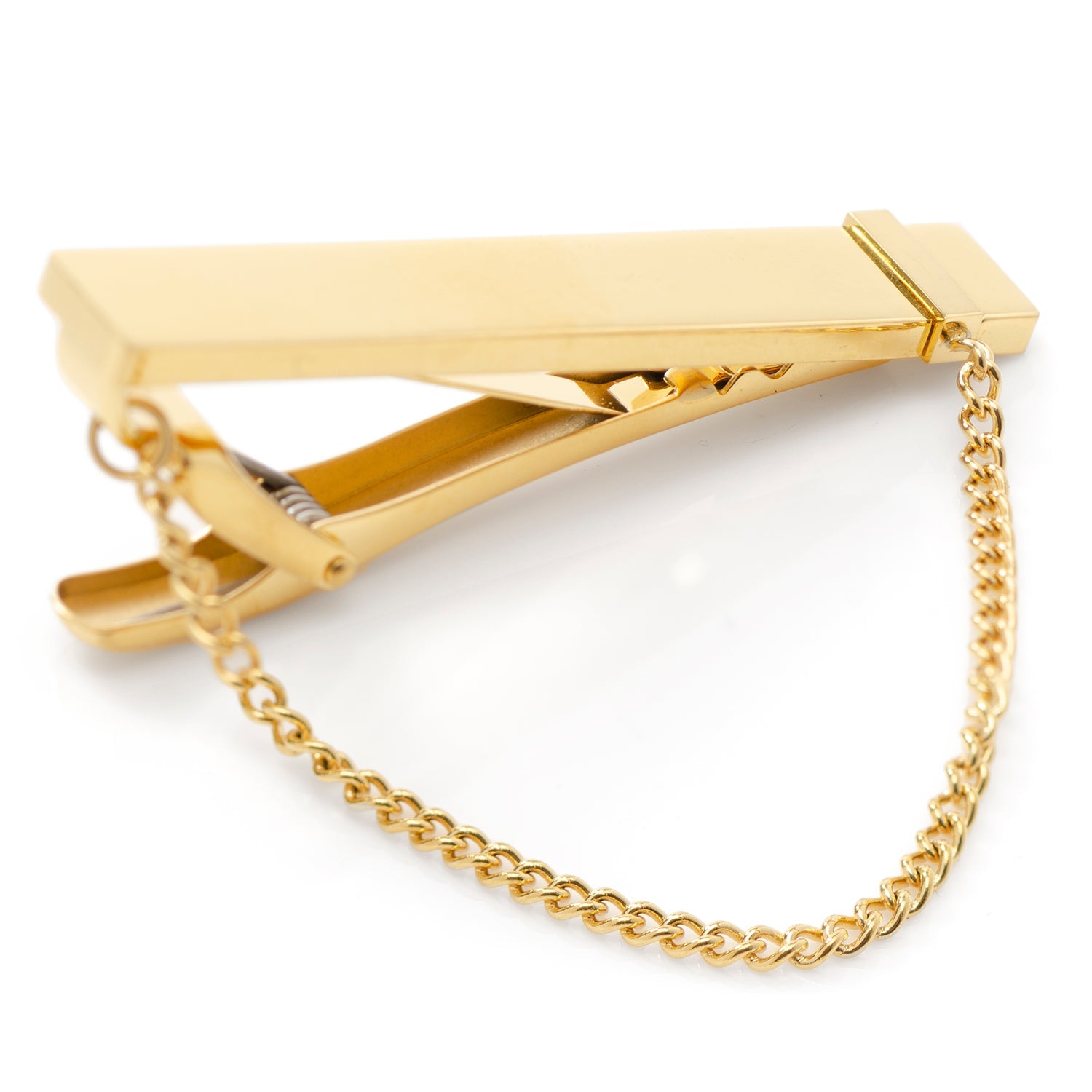 Gold tie clip with chain on a white background