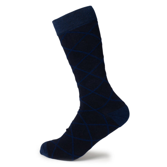 Navy blue sock with diamond pattern on a white background