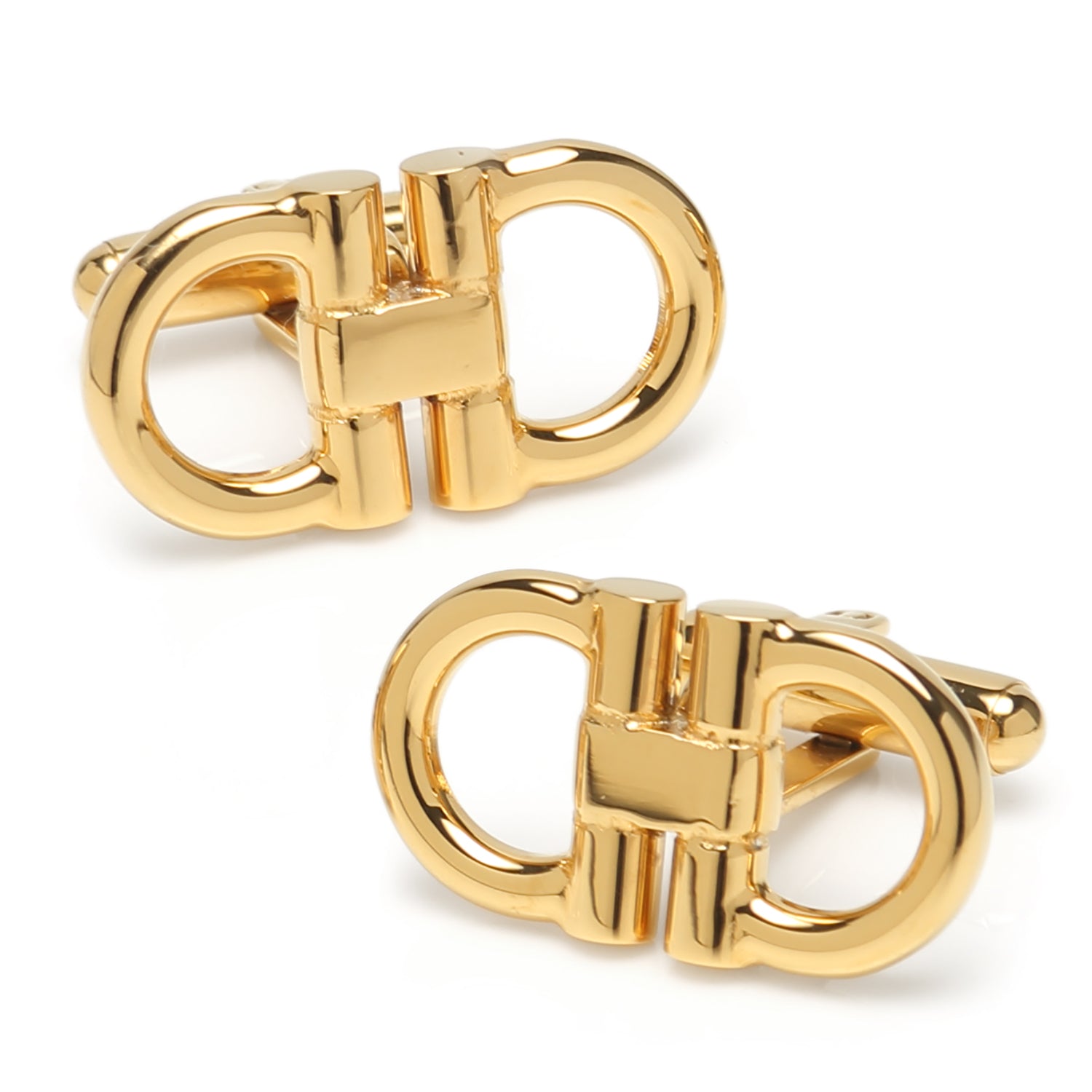 Pair of gold cufflinks on a white background