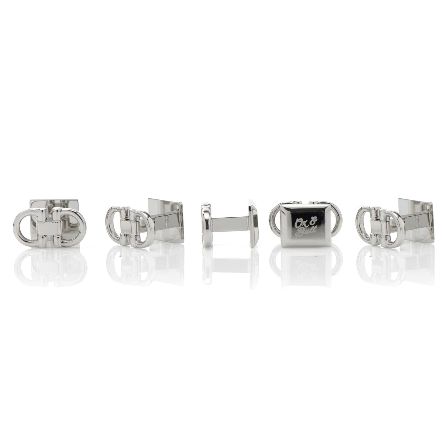 Set of silver cufflinks on a white background