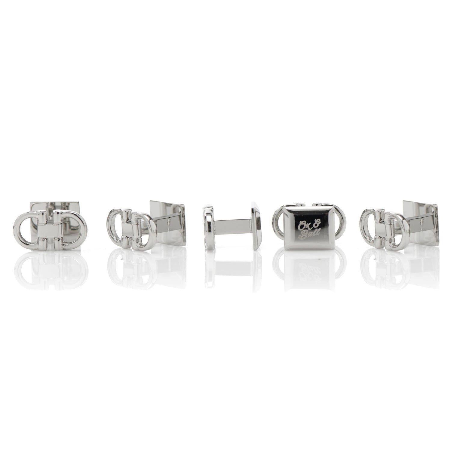 Set of silver cufflinks on a white background
